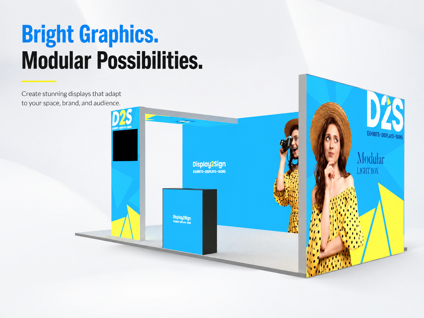 Modular SEG light box booth with illuminated silicone edge graphics at a trade show